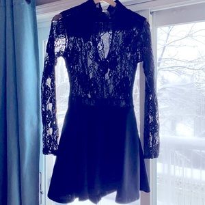 Black lace dress with shorts underneath.